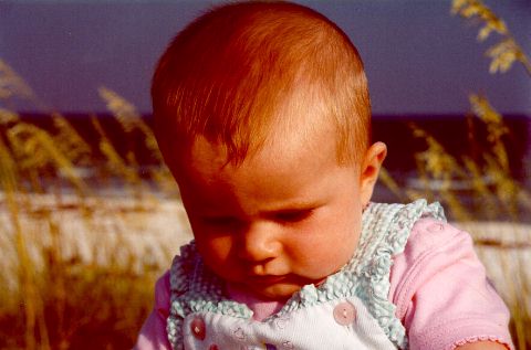 [Anna is deep in thought at Pensacola - July 2000]