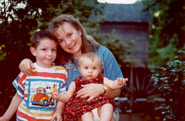 [Joshua,Mom,Anna at Stone Mountain Park Grist Mill - Summer 2000]